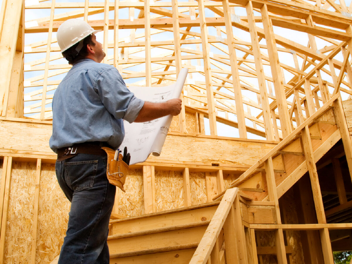 Man Inspecting Construction Work